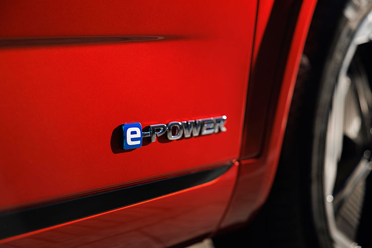 New Fuji Red Qashqai 2024 e-POWER logo close up